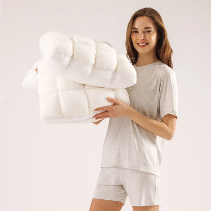 Cloud-like Pillow — A fluffy, soft bed pillow that offers cloud-like comfort.