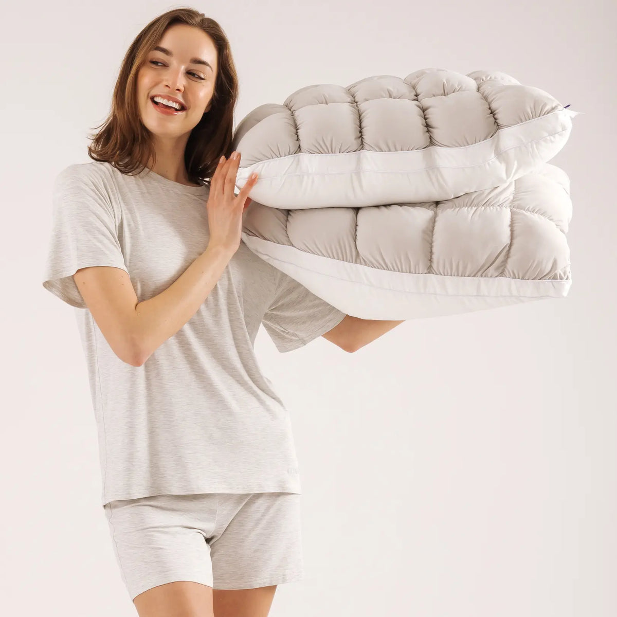 Cloud-like Pillow — A fluffy, soft bed pillow that offers cloud-like comfort.