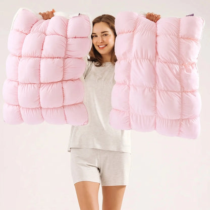 Cloud-like Pillow — A fluffy, soft bed pillow that offers cloud-like comfort.